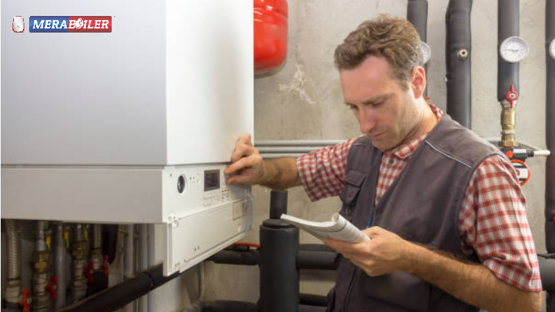 Gas engineer performing annual boiler service to prevent emergency breakdowns